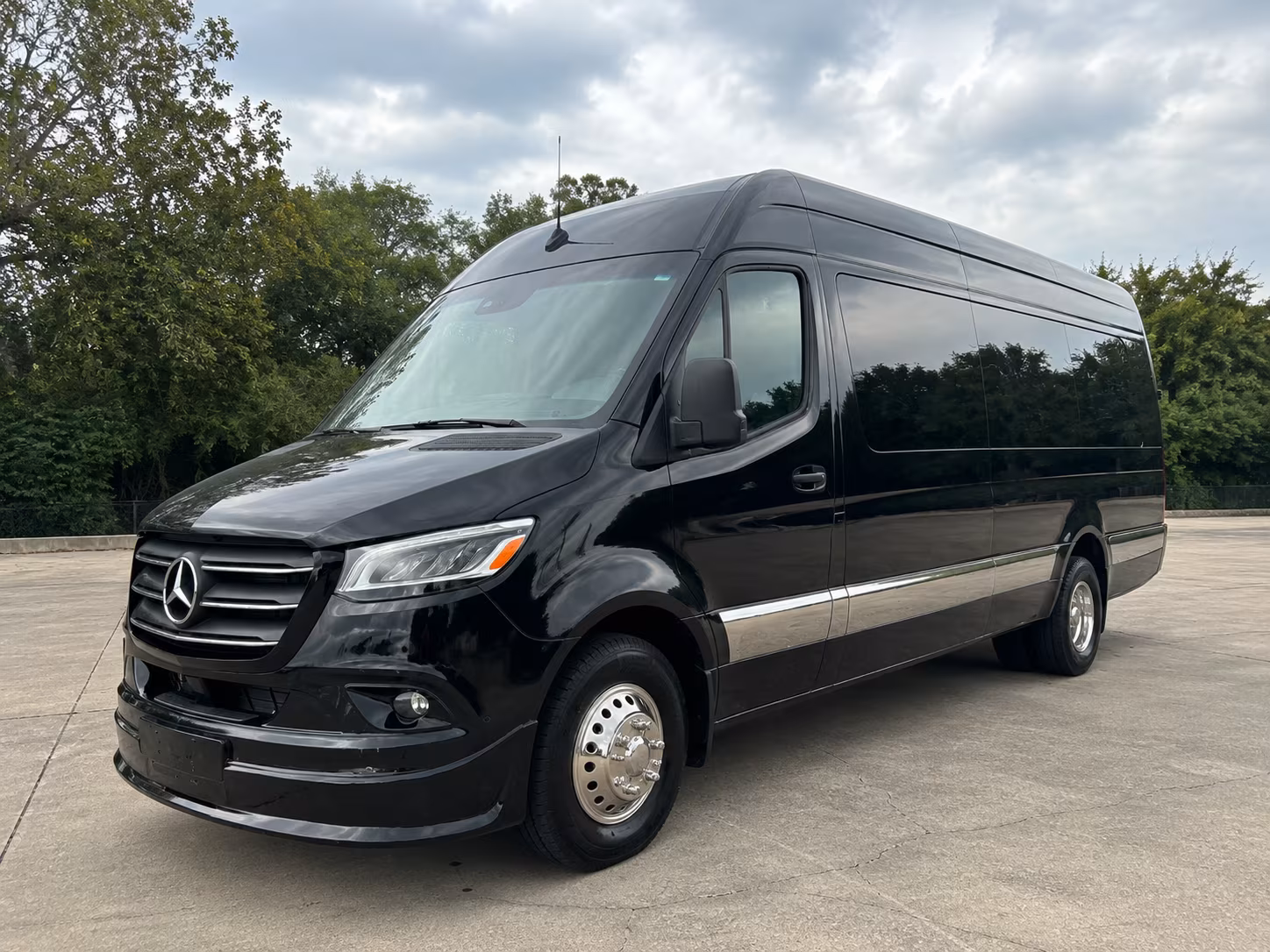 auburn sprinter van with driver
